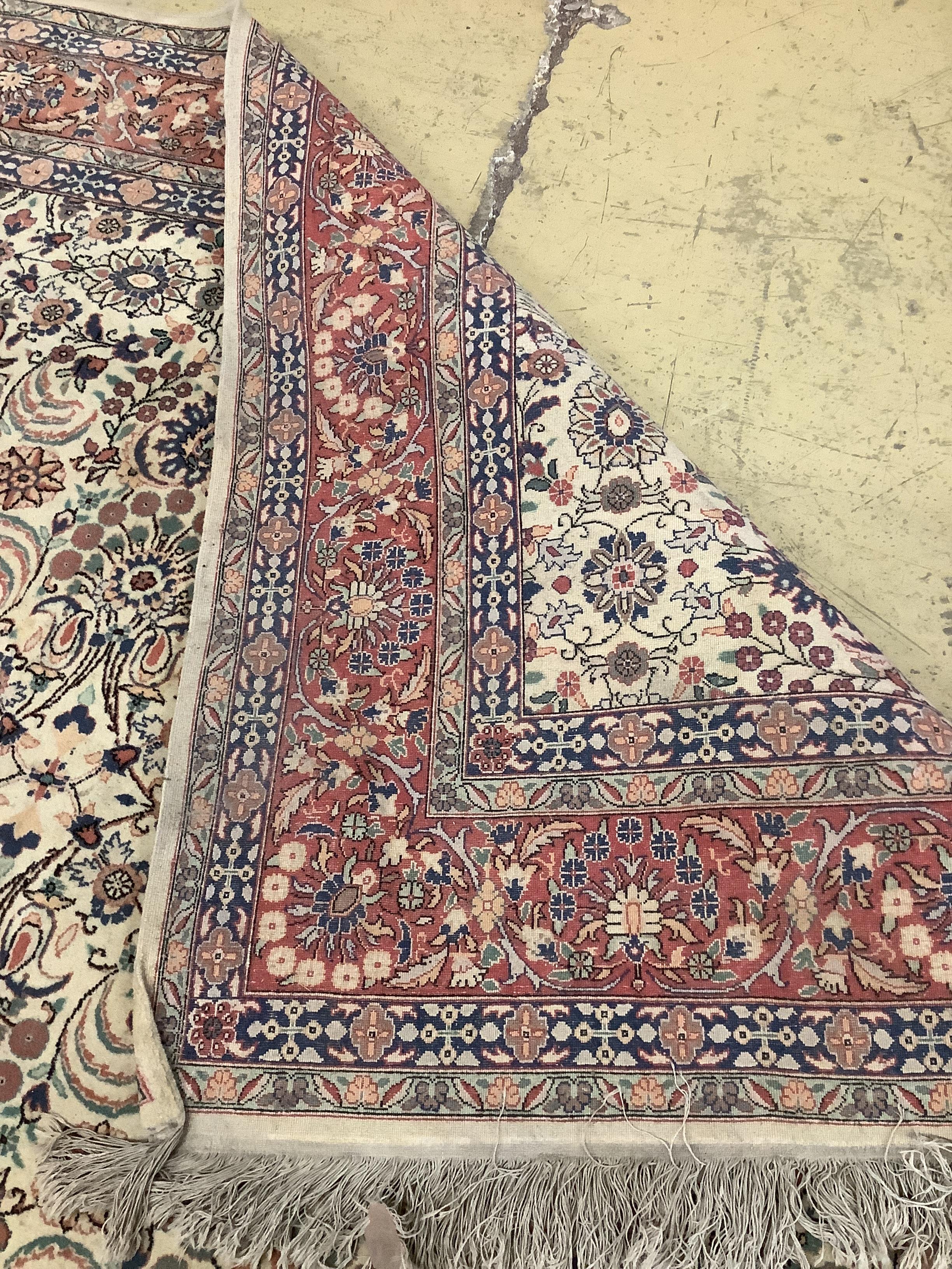 A North West Persian style ivory ground carpet, 300 x 195cm
